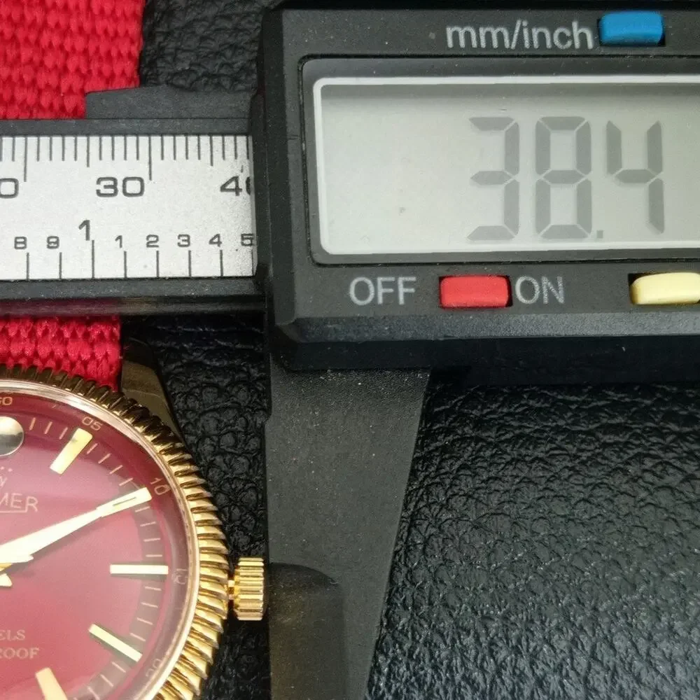 Vintage 1977 Roamer Manual Mens Gold Watch W/Nato Strap & Red accents